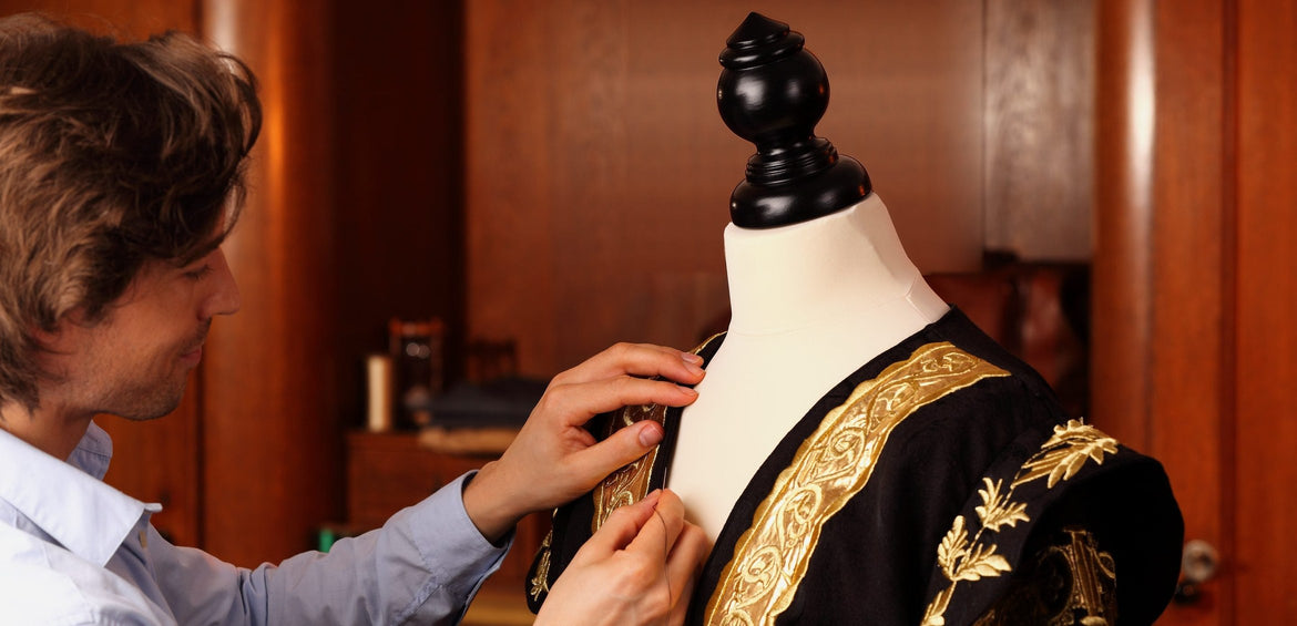 Presidential gown with gold-embroidered facings on a dress form