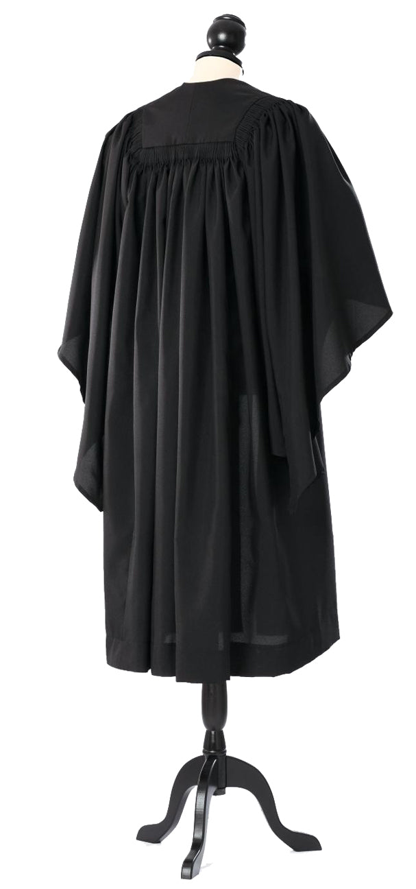 Cambridge bachelor's gown in black, back view with gathered shoulders