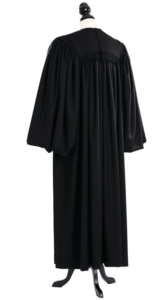 Magisterial US Judge Robe in black, back view, gathered yoke, full bloused sleeves, on a tailor mannequin