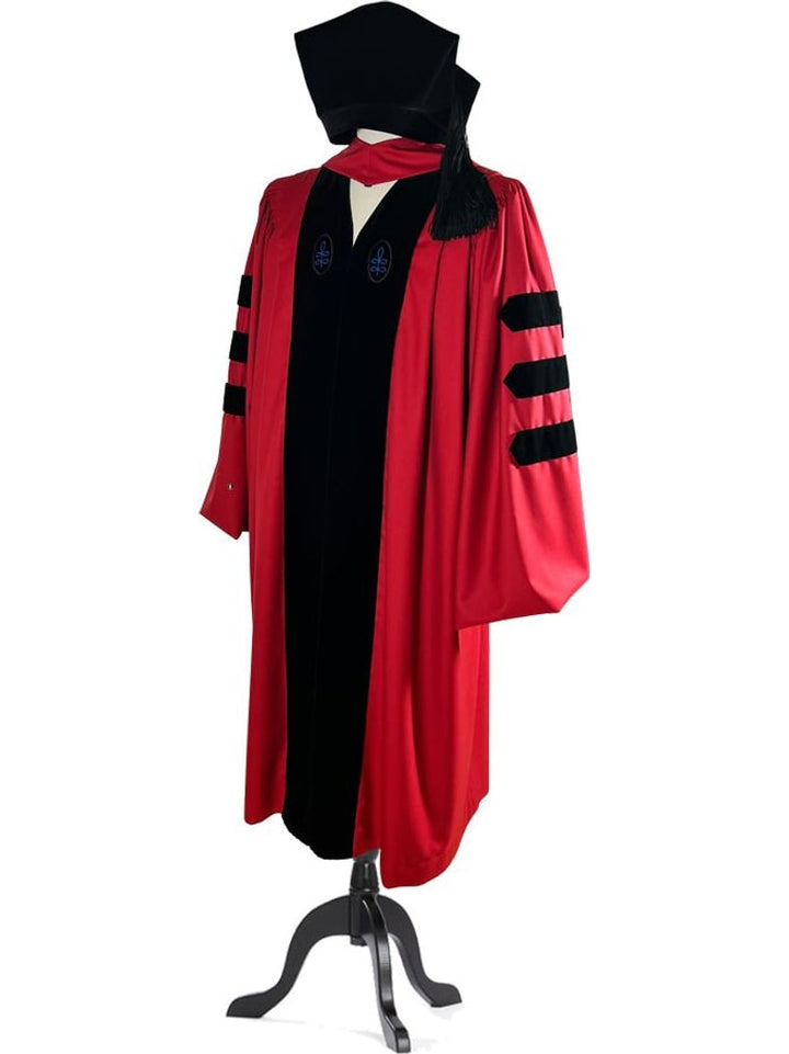 Harvard doctoral robe in crimson with hood and velvet cap, full view