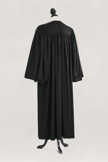 Magisterial US Judge Robe — back view on bust and stand, studio photograph