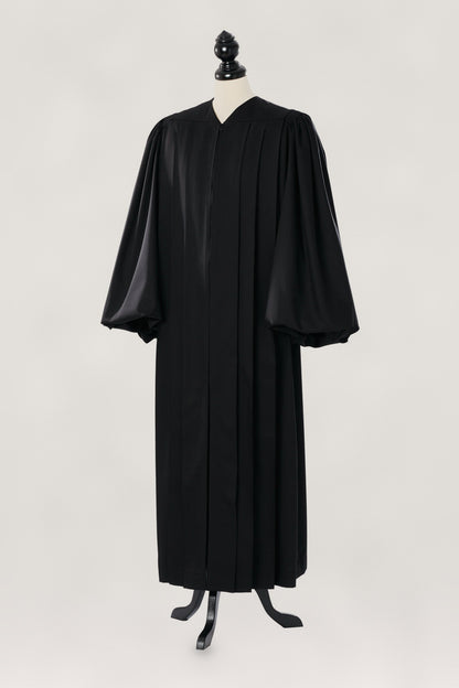Magisterial US Judge Robe in black, open front, full bishop-bloused balloon sleeves, full length, on a tailor mannequin