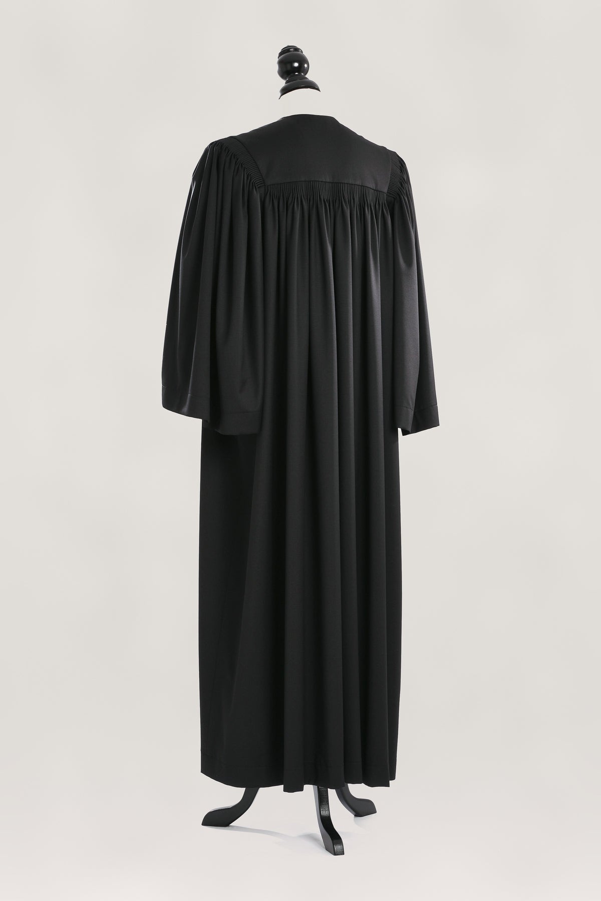 Principal US Judge Robe — back view on bust and stand, studio photograph