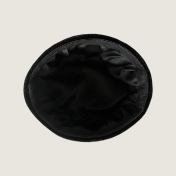 Inside of the beret: black satin lining