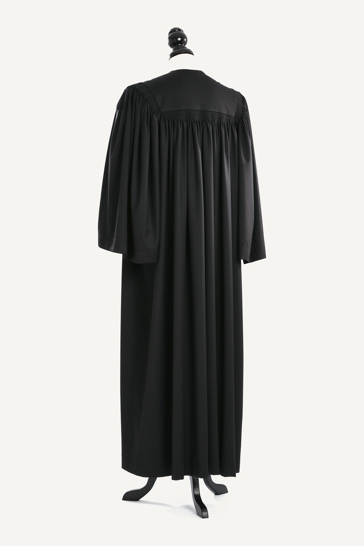 Principal US Judge Robe — back view on bust and stand, studio photograph