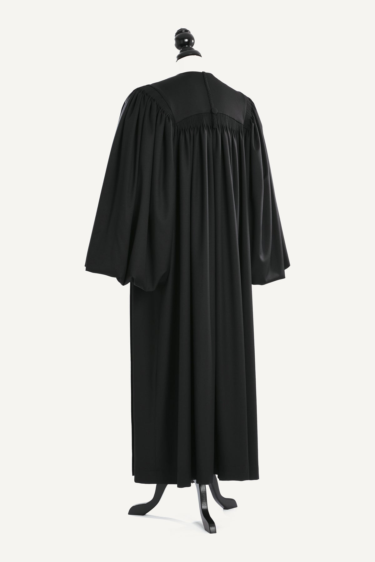 Magisterial US Judge Robe — back view on bust and stand, studio photograph