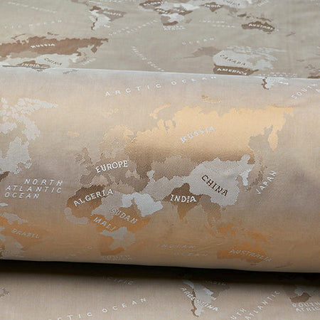 Jacquard lining with world map in gold