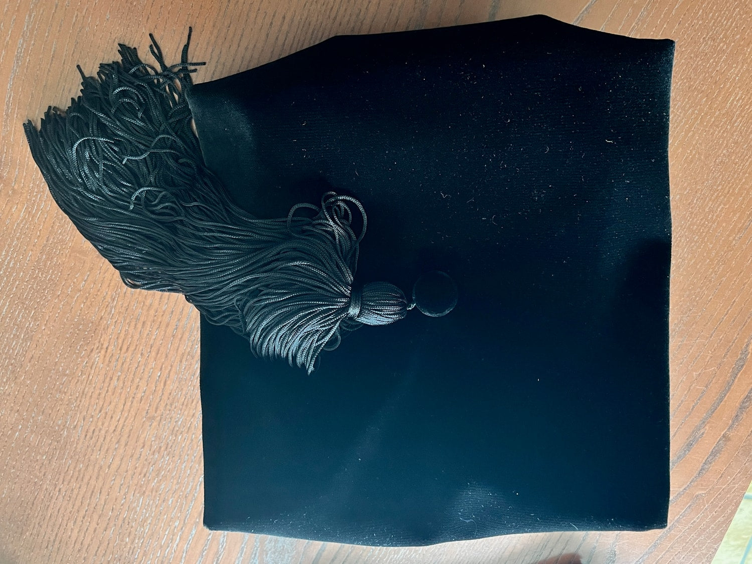 Velvet cap (tam) of the Harvard doctoral robe in Holland and Sherry velvet, with tassel